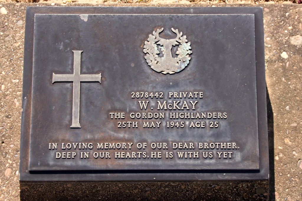 Image showing an example of one of the war graves in the cemetary. This one is for W McKay who died on 25 May 1945 aged 25
